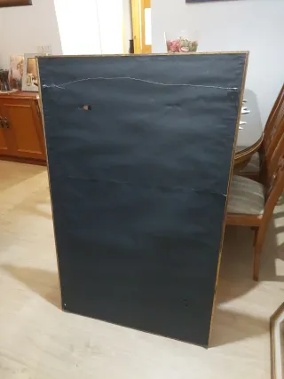 Espejo decorativo marco negro y dorado.