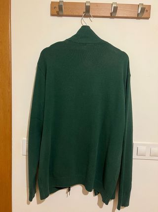 Jersey de punto con cremallera y cuello alto