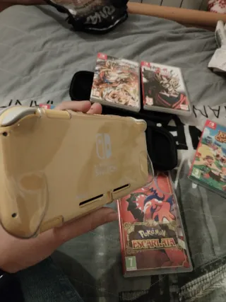 Nintendo Switch Lite + 5 Juegos