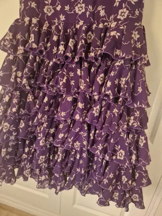 Traje de flamenca morado con flores