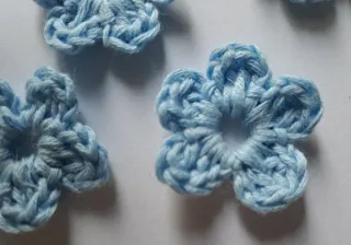 10 Fiorellini Copribottoni Azzurri