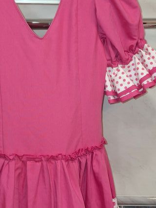 Traje de flamenca rosa volantes