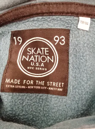 Sudadera niño con estampado de zapatillas