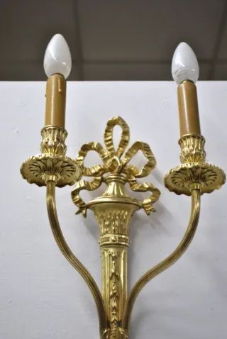 Antiguos apliques isabelinos de bronce