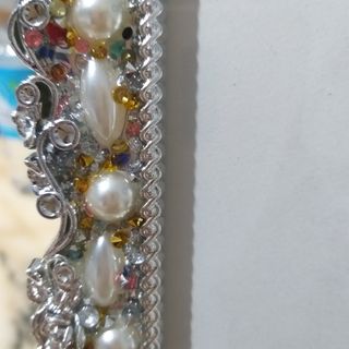 Cornice portafoto decorata con perle e strass