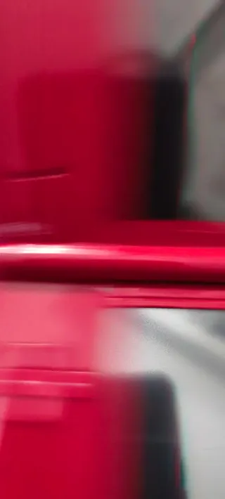 Nintendo DSi Roja + Cargador no original.