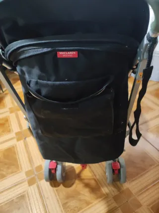 Silla de paseo Maclaren con plástico y saco
