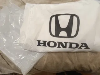 Honda cortavientos Blanco chubasquero