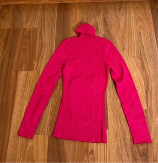Jersey cuello alto fucsia tachuelas Talla XS