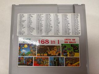 Consola tipo NES + mandos + pistola + 5 juegos