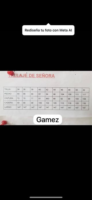 Vestido de flamenca rosa lunares y mantoncillo.