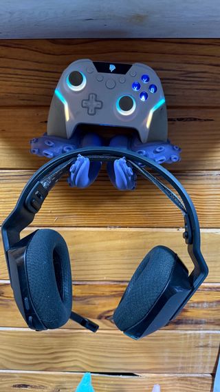 Soporte Mando y Auriculares Pulpo Morado