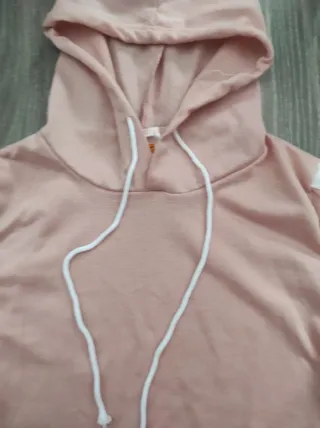 Sudadera corta rosa con rayas blancas