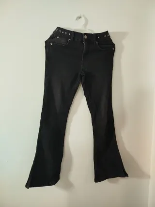 Pantalón campana negro con estrellas talla 10.