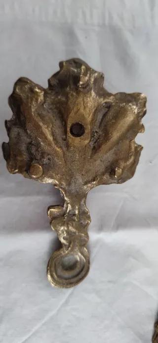 Palmatoria de bronce