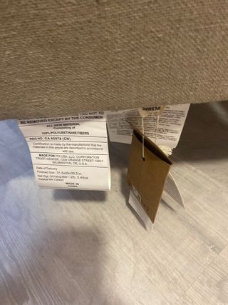 Sillón butaca Zara Home tela y madera