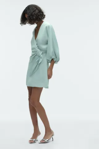 Vestido verde cruzado con lazada