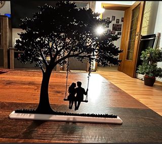 Figura Decorativa Pareja en Columpio