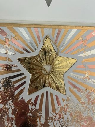 Busta e biglietto Dior con stella