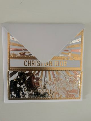 Busta e biglietto Dior con stella