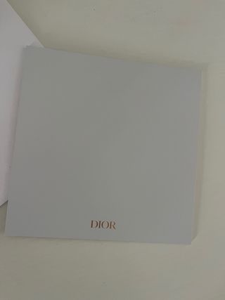 Busta e biglietto Dior con stella