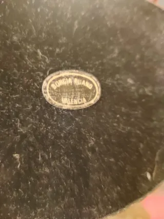 Figura de bronce niño