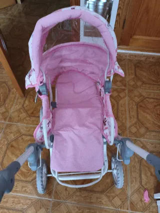 Carrito de muñecas rosa
