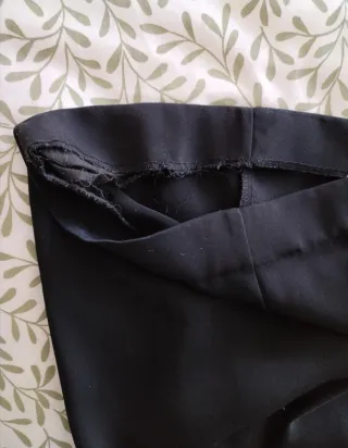 Mono negro wide leg con cinturón