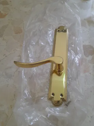 Juego manillas puerta doradas