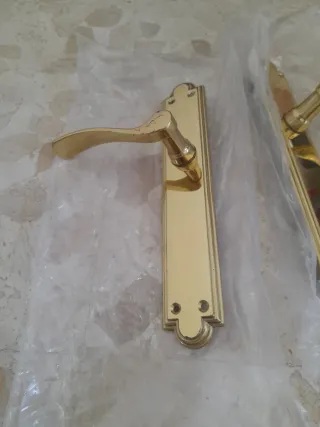 Juego manillas puerta doradas