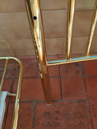 Cuna metálica dorada brillante 123x63