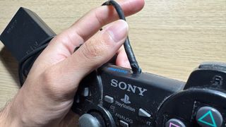 PS2 Slim Nera + Controller Ufficiale Sony