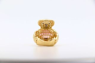 ANILLO OSO CON CIRCONITAS ROSAS. Oro 18k.