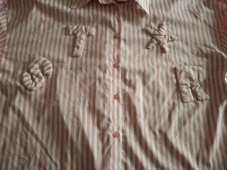 Camisa T L/ XL. Ver medidas