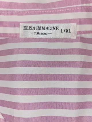 Camisa T L/ XL. Ver medidas