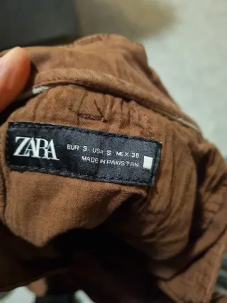 Pantalones vaqueros hombre rotos beige