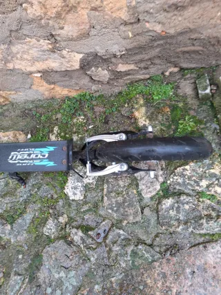 Patinete infantil morado.