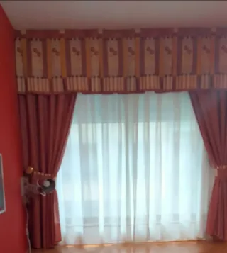 Tende granate e arancioni