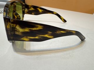 Occhiali da sole tartarugati verdi