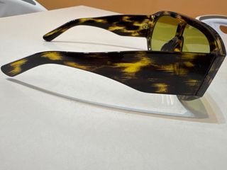 Occhiali da sole tartarugati verdi