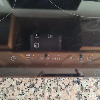 Placa de Inducción Samsung con golpe en la esquina