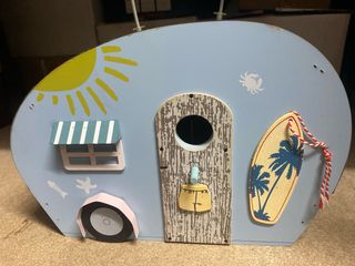 Casa de pájaros decorativa estilo caravana
