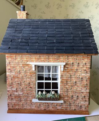 Casa de muñecas tienda La Moda Elegante