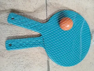 Juego de palas de playa con pelota