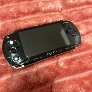 PSP 2000 Negra + Cargador + UMD