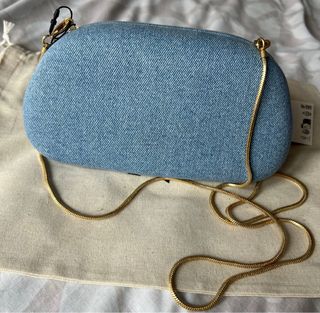 Bolso de mano denim con asa dorada