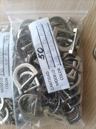 Fibbie placcate in argento per borse e zaini