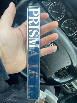 Emblema Lancia Prisma 1.6 ie