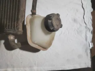 Radiador Aprilia SR con depósito