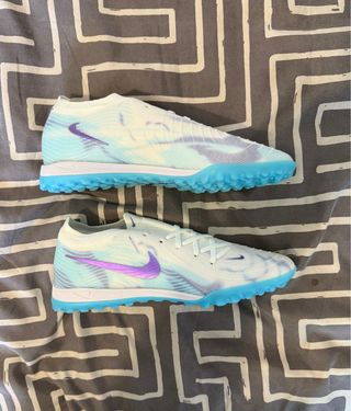 Zapatilla multitaco Nike azul y blanco